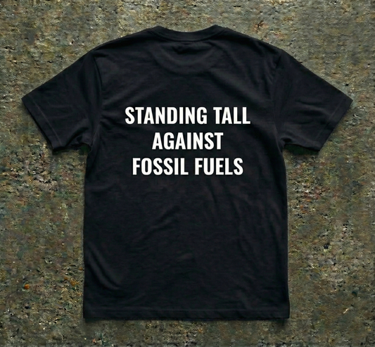 Back view of Black t-shirt with bold white text STANDING TALL AGAINST FOSSIL FUELS. Industrial graphic tee for offshore wind supporters